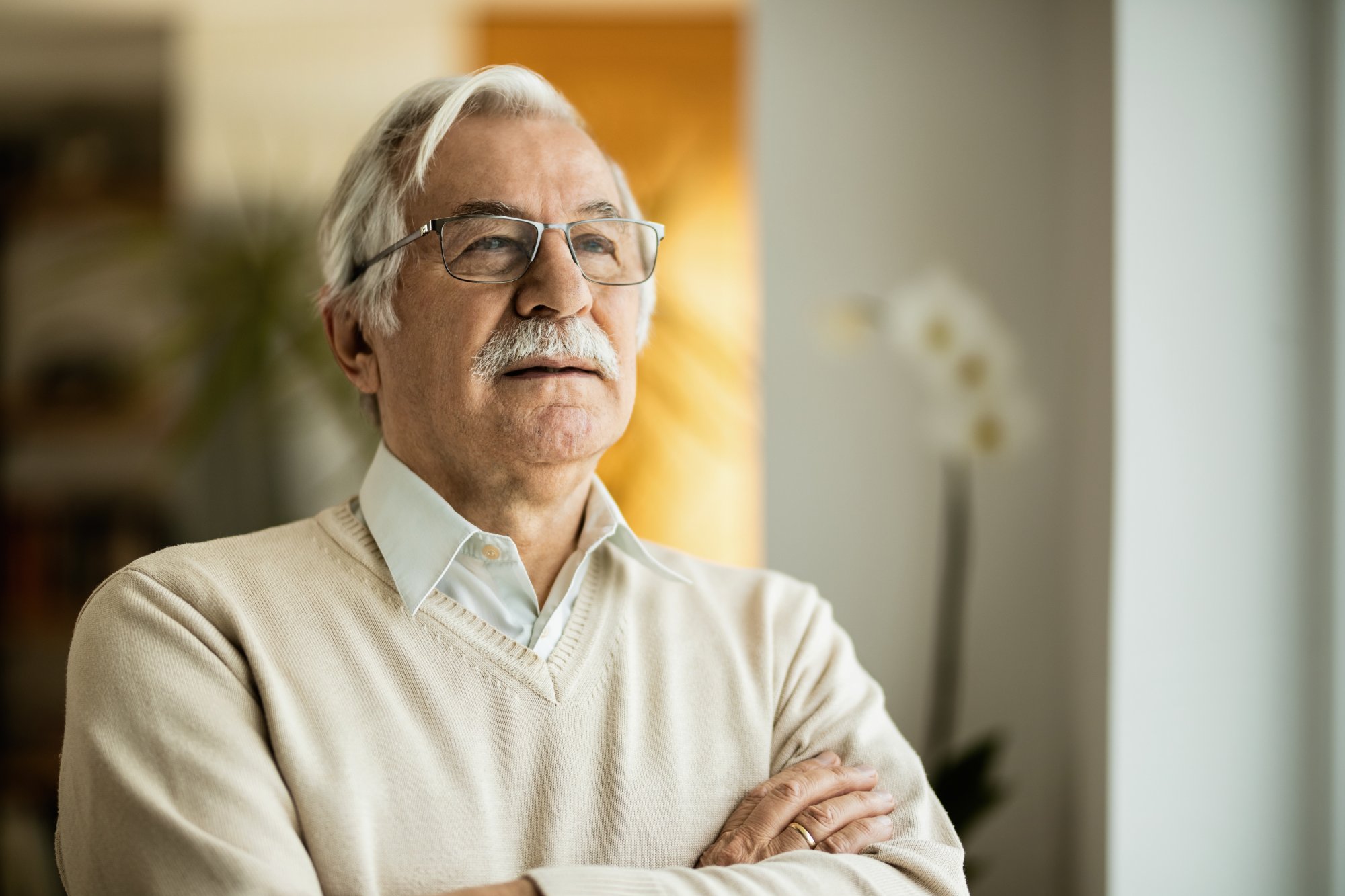 Senior man contemplating final expense insurance options