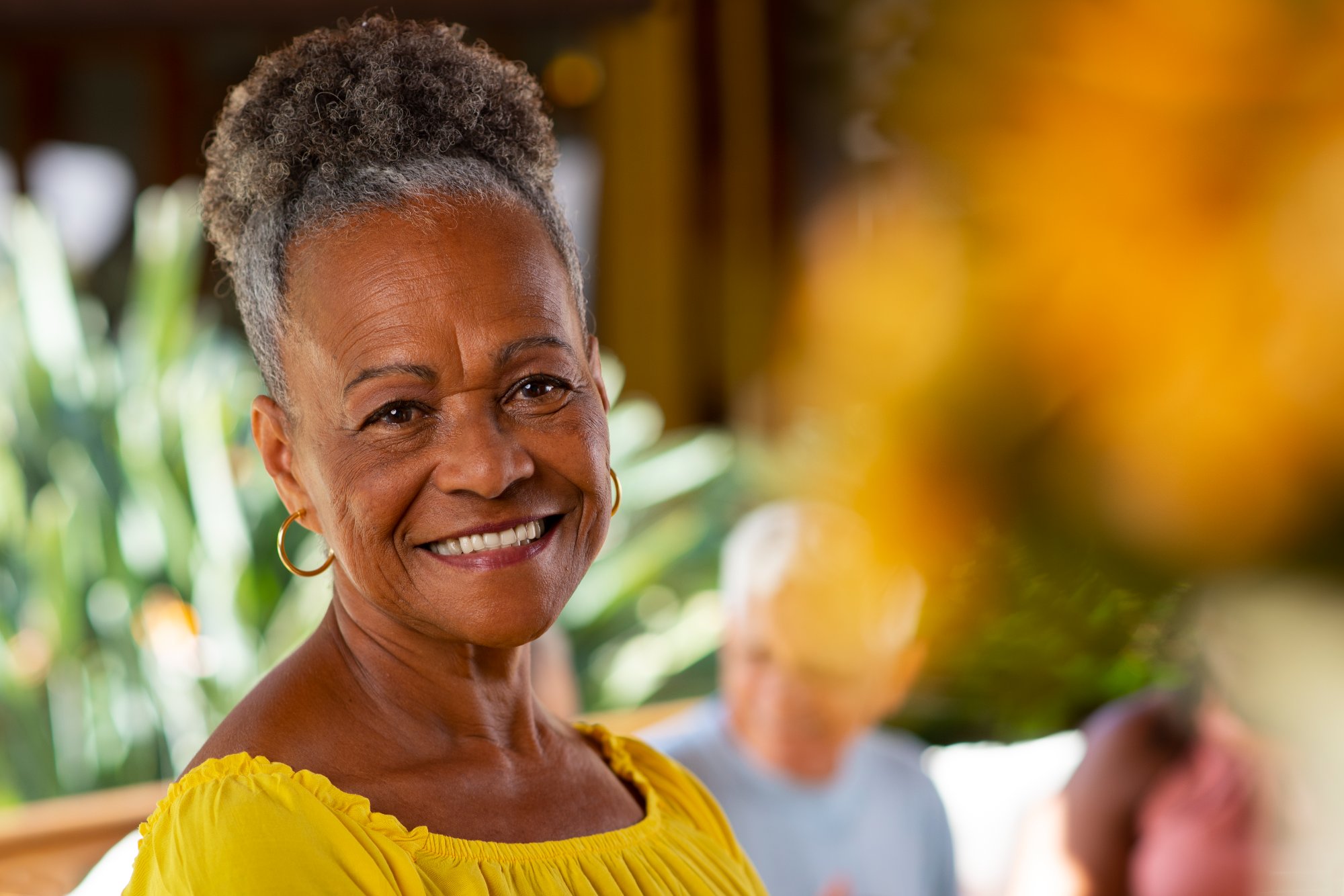 Senior woman smiling — planning ahead with final expense coverage
